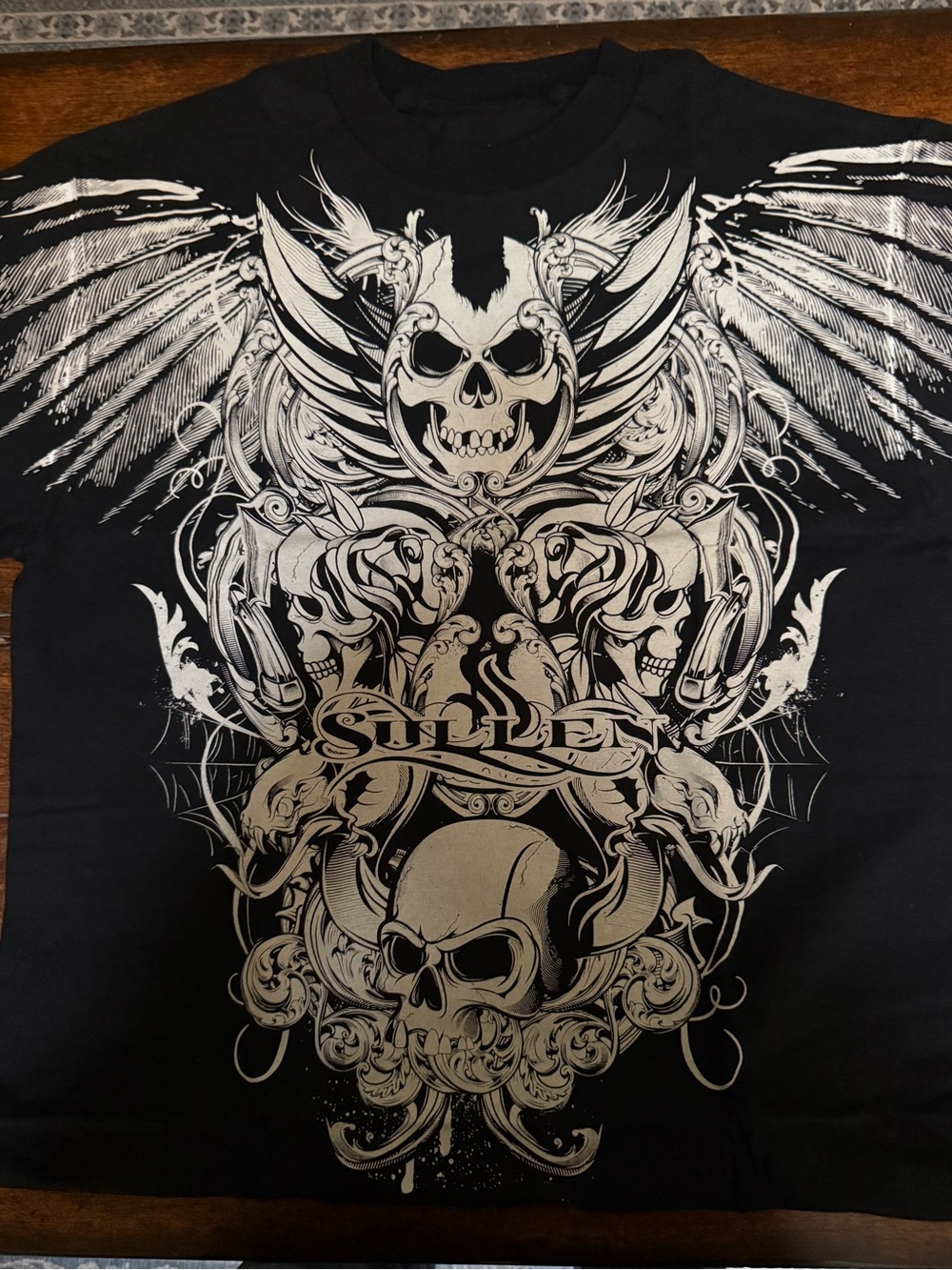 Sullen Black Short-Sleeve Graphic Skull Tee with Winged Design